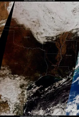 A solar eclipse darkens parts of North America