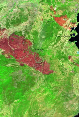 Burn scar in red from wildfires in the Aude region in France
