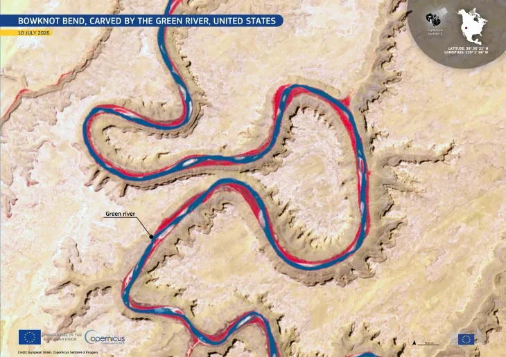 Satellite image of Bowknot Bend on the Green River in the United States, showing the river winding through a series of tight, looping meanders carved into pale desert canyon terrain. The river appears dark blue with bright red margins in the false-color imagery. A label identifies the Green River, with location coordinates and a 500 m scale shown on the map.