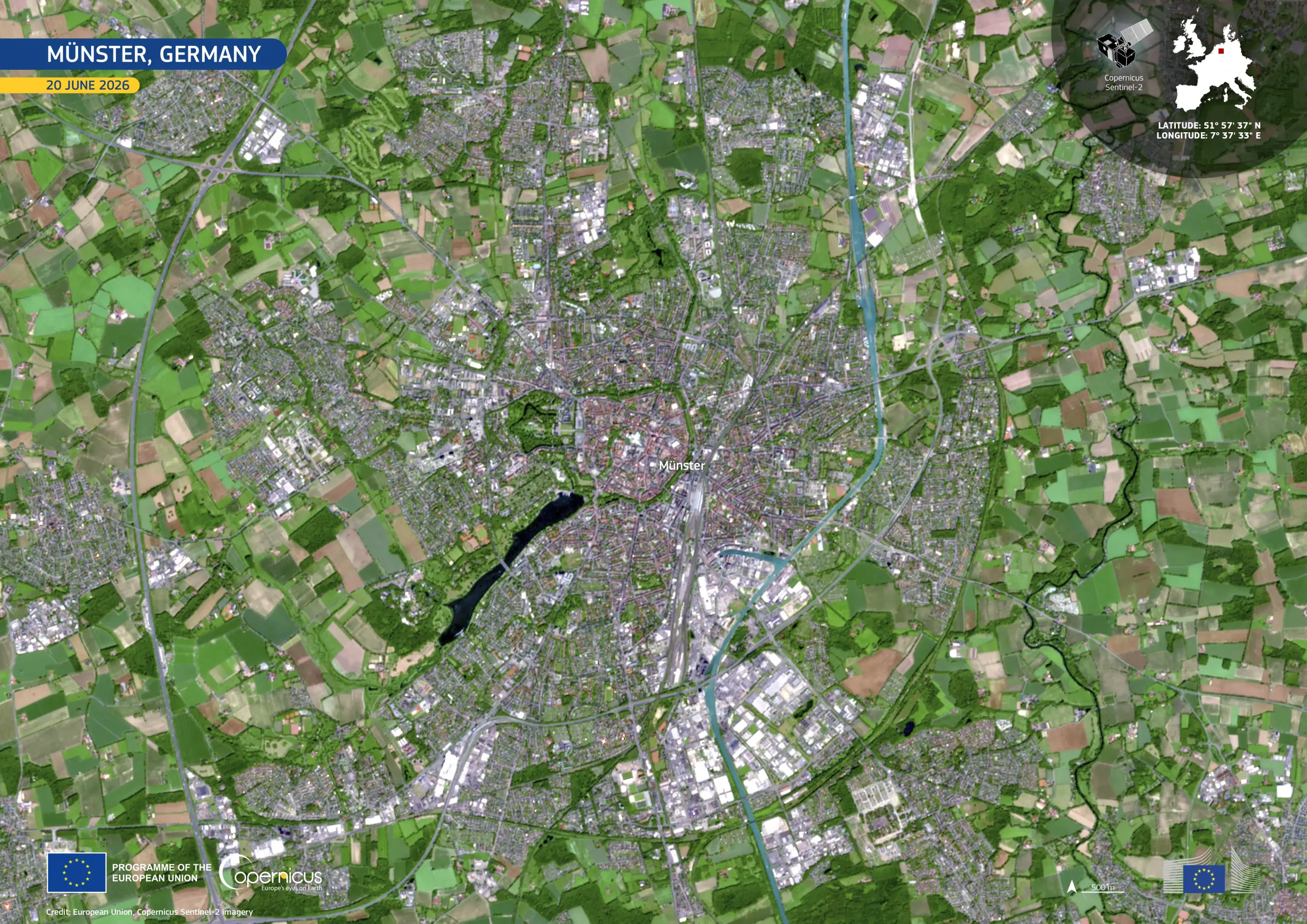 The satellite image shows the city of Munster surrounded by fields in different shades of brown.