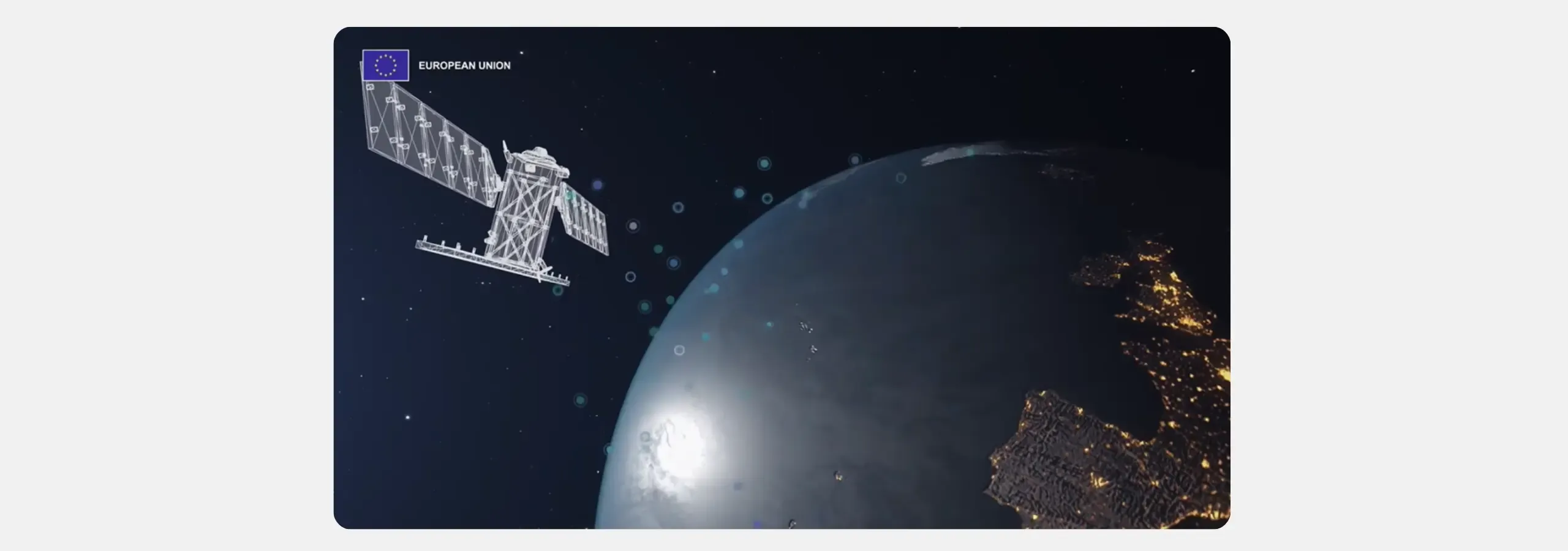 Artistic render of a satellite in low Earth orbit, with city lights visible across Europe on the night side of the planet below. 