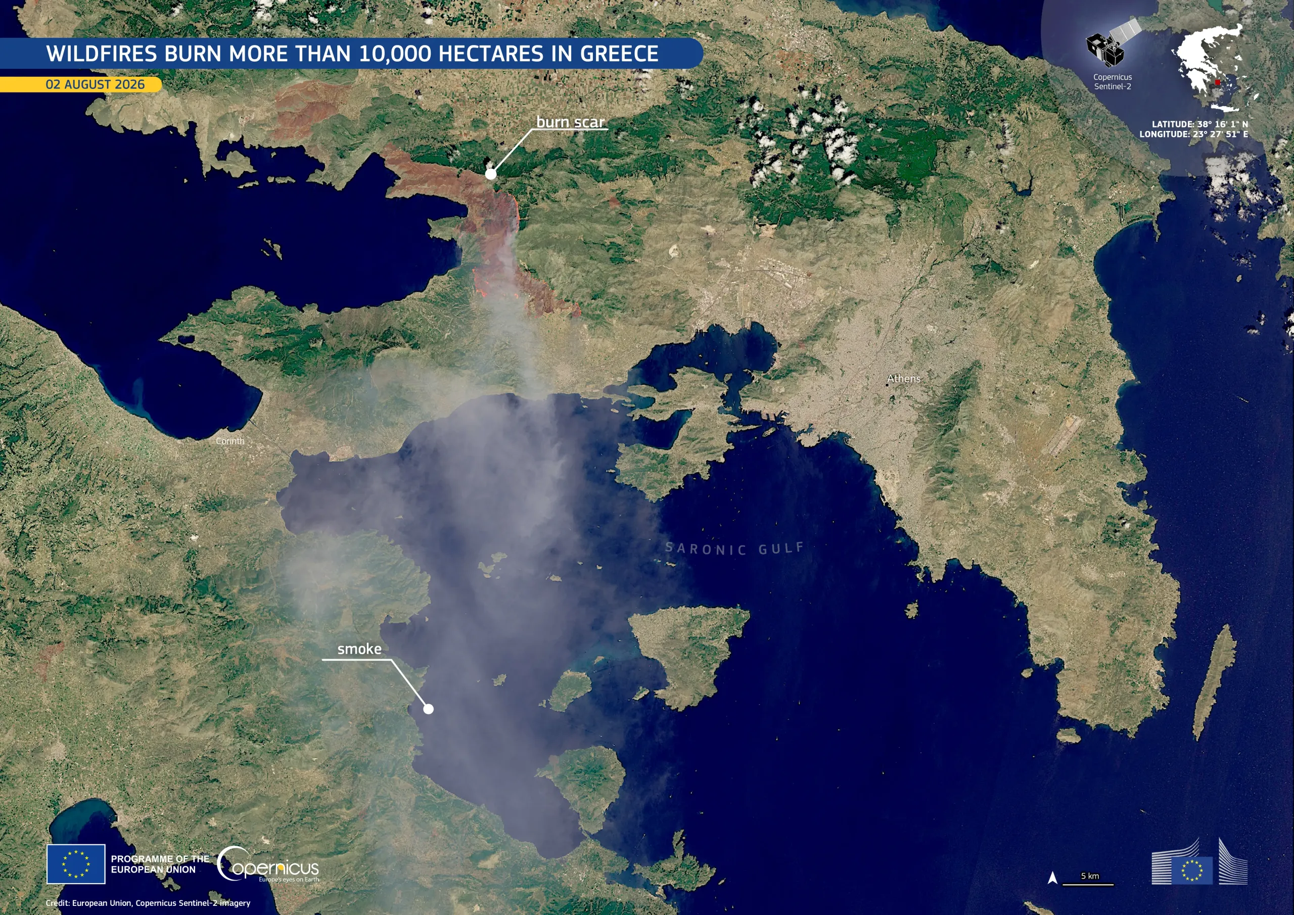 Satellite image of southern Europe centred on Greece, showing a large plume of grey smoke drifting across the mainland and surrounding sea.