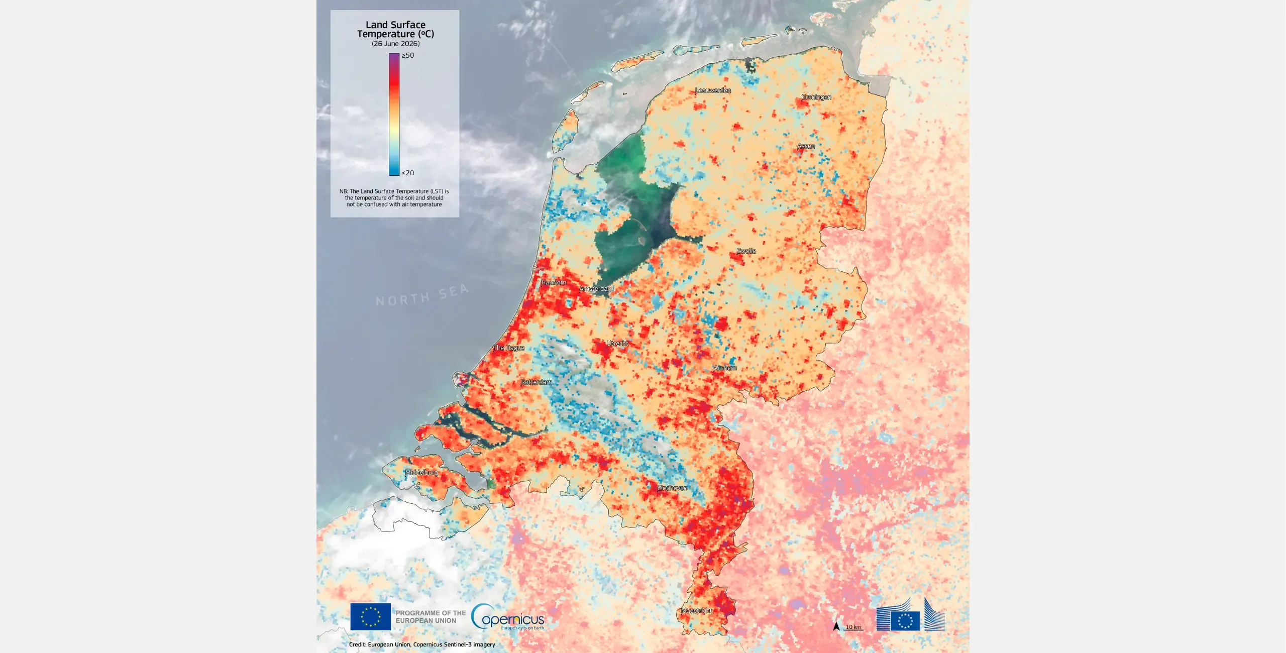 Map of land surface temperatures across the Netherlands and surrounding areas on 26 June 2026, based on Copernicus Sentinel-3 satellite imagery. Temperatures range from about 20°C to above 50°C, with higher temperatures shown in red and purple and lower temperatures in blue. The map shows particularly high surface temperatures across urban and inland areas, while cooler temperatures are visible over the North Sea and some vegetated areas.