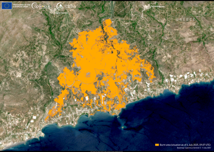 A satellite image of a coastal area in eastern Crete, Greece, with the burnt area of the Achlia wildfires highlighted in orange. The burnt area forms a large, irregular shape covering a significant portion of the inland terrain, extending close to the ...