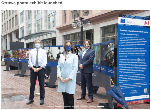 A picture containing text, building, ground, person</p>
<p>Description automatically generated